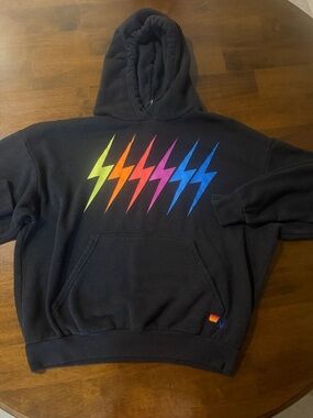 Aviator Nation Black Pullover Hoodie with Rainbow Lightning Bolts